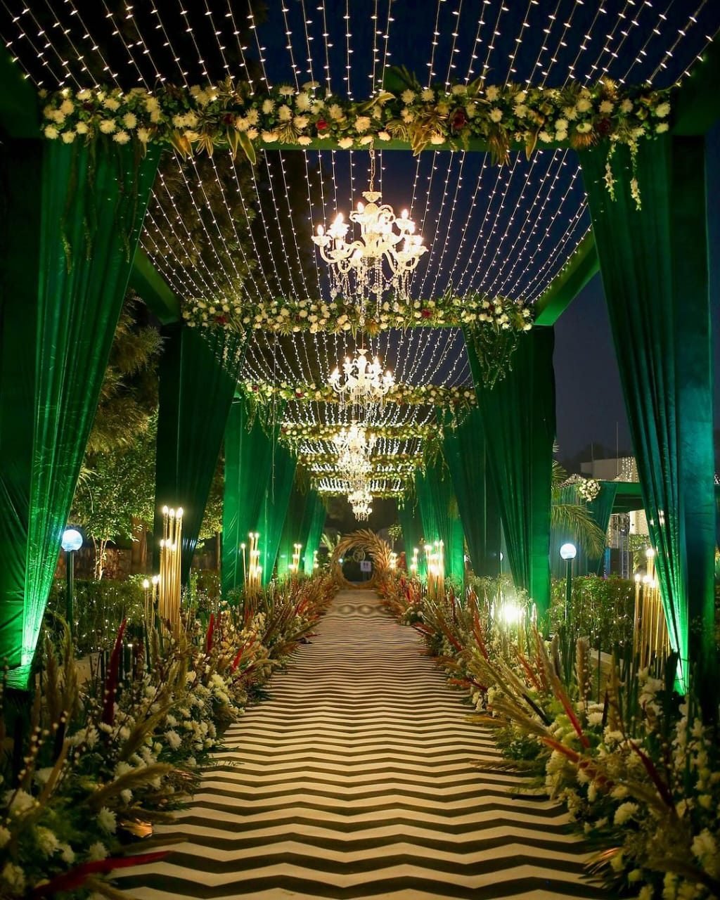 Elegant floral wedding aisle decor by Inspire Events